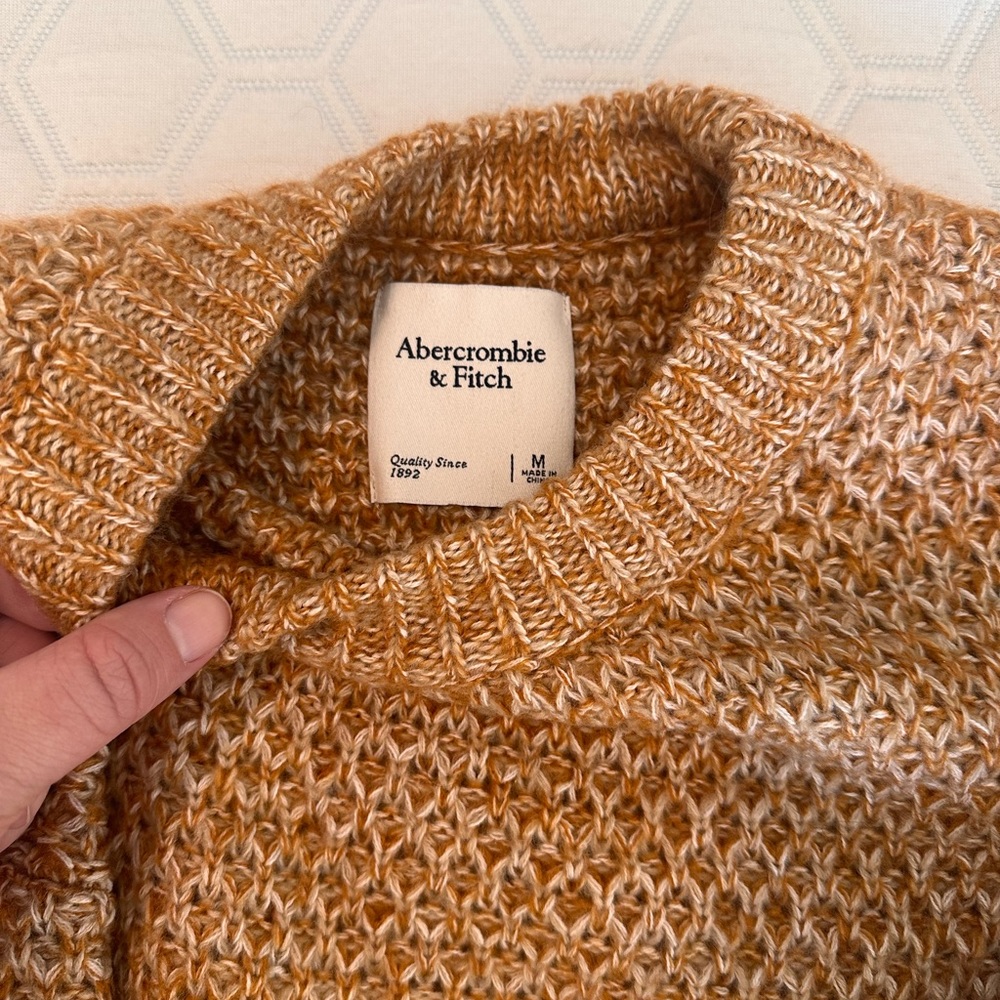 Orange knit sweater